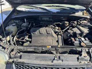 2004 Ford Escape Limited with VIN 1FMCU94144KA88842, listed as a IAAI auction lot 41643194 with 148,082 mi miles. Bid and sale history available at carsss.com. Image 10.