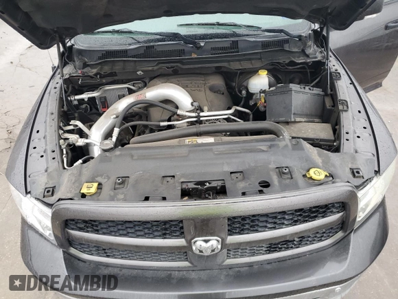 2015 Ram 1500 Outdoorsman z VIN 1C6RR6LT8FS639673, wystawiony jako Copart lot #79930724 z przebiegiem 160 354 mil mil oraz Szkoda całkowita • Salvage title. Historia ofert i sprzedaży dostępna na DreamBid. Obrazek 11.