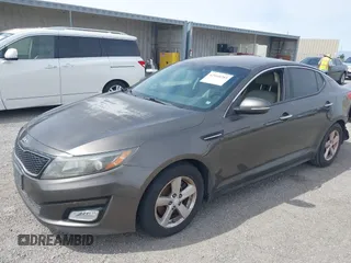 2014 Kia Optima LX with VIN 5XXGM4A7XEG334175, listed as a IAAI auction lot 42169281 with 148,774 mi miles. Bid and sale history available at carsss.com. Image 2.