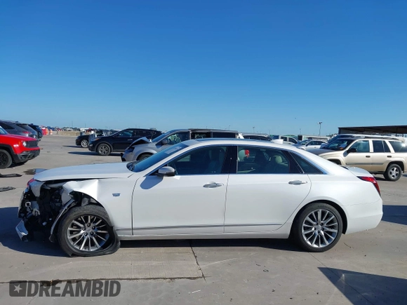 2018 Cadillac CT6 Luxury AWD z VIN 1G6KD5RS9JU151575, wystawiony jako IAAI lot #42078361 z przebiegiem 28 187 mil mil oraz . Historia ofert i sprzedaży dostępna na DreamBid. Obrazek 15.