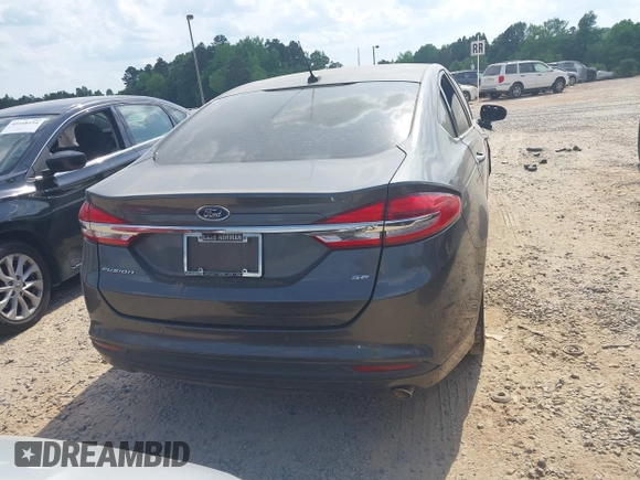 2017 Ford Fusion SE z VIN 3FA6P0H71HR410878, wystawiony jako IAAI lot #42135622 z przebiegiem 99 462 mil mil oraz . Historia ofert i sprzedaży dostępna na DreamBid. Obrazek 16.