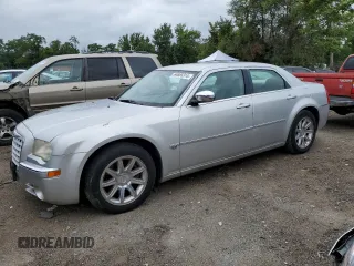 2006 Chrysler 300 C with VIN 2C3LA63H06H527558, listed as a Copart auction lot 64665314 with 74,237 mi miles and Salvage Title. Bid and sale history available at carsss.com. Image 1.