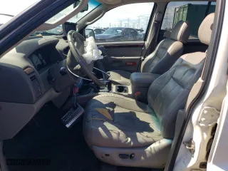 2003 Jeep Grand Cherokee Limited with VIN 1J4GW58N83C511981, listed as a Copart auction lot 61734014 with 174,775 mi miles and Salvage Title. Bid and sale history available at carsss.com. Image 7.