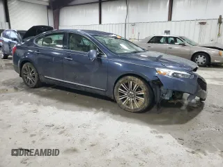 2014 Kia Cadenza Premium with VIN KNALN4D77E5134637, listed as a Copart auction lot 83907434 with 141,104 mi miles and Salvage Title. Bid and sale history available at carsss.com. Image 4.