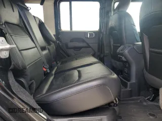 2023 Jeep Wrangler Sahara z VIN 1C4JJXP67PW513595, wystawiony jako Copart lot #53482175 z przebiegiem 30 943 mil mil oraz Szkoda całkowita • Salvage title. Historia ofert i sprzedaży dostępna na DreamBid. Obrazek 10.