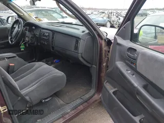 2004 Dodge Dakota SLT with VIN 1D7HG48NX4S751497, listed as a IAAI auction lot 41737935 with 106,064 mi miles. Bid and sale history available at carsss.com. Image 5.