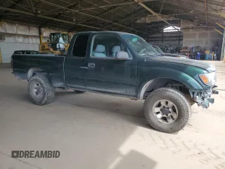 1999 Toyota Tacoma PreRunner with VIN 4TASN92N2XZ497397, listed as a Copart auction lot 56367005 with 281,137 mi miles and Salvage title. Bid and sale history available at DreamBid. Image 4.