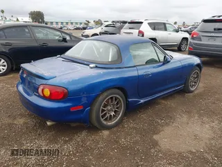1999 Mazda MX-5 Miata z VIN JM1NB3539X0130910, wystawiony jako IAAI lot #42175118 z przebiegiem 91 570 mil mil oraz . Historia ofert i sprzedaży dostępna na DreamBid. Obrazek 4.
