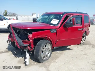 2011 Dodge Nitro Heat with VIN 1D4PU4GXXBW517547, listed as a IAAI auction lot 41785509 with 233,240 mi miles. Bid and sale history available at carsss.com. Image 23.