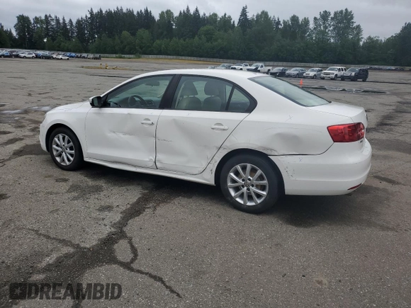 2012 Volkswagen Jetta SE with VIN 3VWDP7AJ5CM301293, listed as a Copart auction lot 57131005 with 93,898 mi miles and Salvage title. Bid and sale history available at DreamBid. Image 2.
