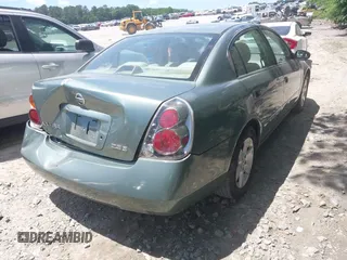 2002 Nissan Altima S z VIN 1N4AL11D02C147963, wystawiony jako IAAI lot #42318252 z przebiegiem 203 894 mil mil oraz . Historia ofert i sprzedaży dostępna na DreamBid. Obrazek 4.