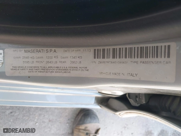 2014 Maserati Ghibli S Q4 with VIN ZAM57RTA8E1085631, listed as a IAAI auction lot 41829745 with 80,418 mi miles. Bid and sale history available at carsss.com. Image 9.