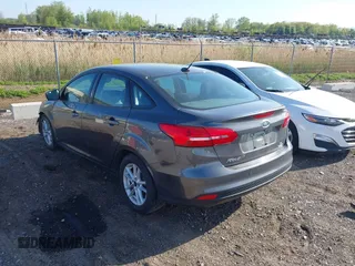 2016 Ford Focus SE with VIN 1FADP3F23GL252346, listed as a IAAI auction lot 42247184 with 99,025 mi miles and . Bid and sale history available at DreamBid. Image 3.