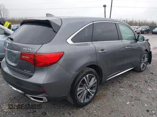 2019 Acura MDX Technology с VIN 5J8YD4H55KL025610, выставлен на аукционе IAAI как лот 41966324 с пробегом 96 877 миль миль и . История ставок и продаж доступна на DreamBid. Изображение 4.