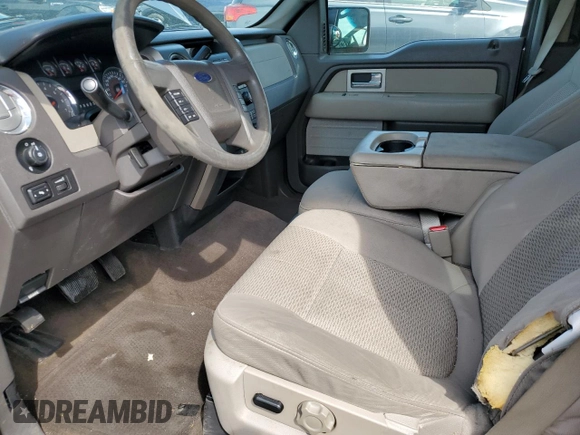 2010 Ford F-150 XL with VIN 1FTFW1CVXAFC48051, listed as a Copart auction lot 50424915 with 179,373 mi miles and Salvage Title. Bid and sale history available at carsss.com. Image 7.