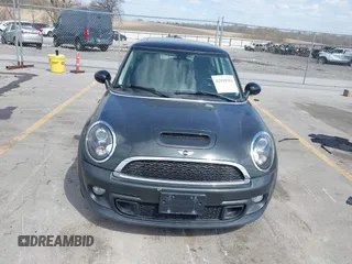 2013 MINI Hardtop S with VIN WMWSV3C59DT394005, listed as a IAAI auction lot 42028362 with 73,510 mi miles and . Bid and sale history available at DreamBid. Image 13.