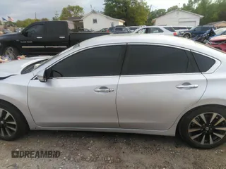 2018 Nissan Altima SR with VIN 1N4AL3AP8JC245501, listed as a IAAI auction lot 42026160 with 114,022 mi miles and . Bid and sale history available at carsss.com. Image 14.
