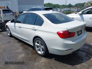 2014 BMW 3 Series 328i with VIN WBA3C1C5XEK107826, listed as a IAAI auction lot 42481701 with 104,151 mi miles and . Bid and sale history available at DreamBid. Image 3.