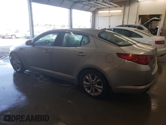 2011 Kia Optima EX with VIN KNAGN4A77B5051923, listed as a Copart auction lot 53129315 with 136,916 mi miles and Salvage Title. Bid and sale history available at carsss.com. Image 2.