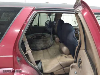 1999 Oldsmobile Bravada with VIN 1GHDT13W9X2701952, listed as a IAAI auction lot 42093184 with 121,532 mi miles. Bid and sale history available at carsss.com. Image 8.
