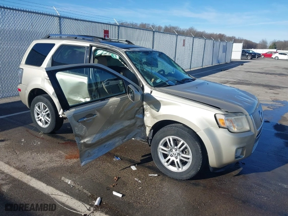 2011 Mercury Mariner Premier with VIN 4M2CN9HG4BKJ05985, listed as a IAAI auction lot 41132168 with 84,031 mi miles. Bid and sale history available at carsss.com. Image 1.