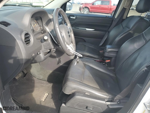 2016 Jeep Compass High Altitude Edition with VIN 1C4NJCEA1GD749348, listed as a Copart auction lot 43502645 with 97,389 mi miles and Salvage Title. Bid and sale history available at carsss.com. Image 7.