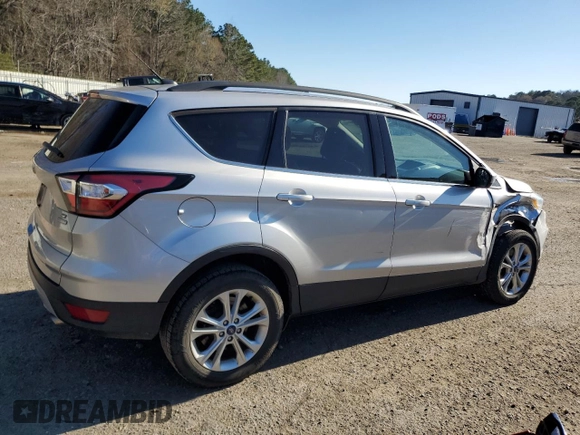 2018 Ford Escape SE with VIN 1FMCU0G90JUC13607, listed as a Copart auction lot 46534215 with 131,633 mi miles and Salvage Title. Bid and sale history available at carsss.com. Image 3.