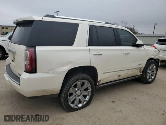 2015 GMC Yukon Denali with VIN 1GKS1CKJ5FR293612, listed as a Copart auction lot 47625975 with 98,533 mi miles and Salvage Title. Bid and sale history available at carsss.com. Image 3.