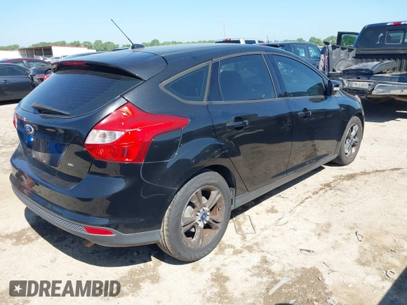 2014 Ford Focus SE with VIN 1FADP3K29EL273107, listed as a IAAI auction lot 42083524 with 140,834 mi miles. Bid and sale history available at carsss.com. Image 4.