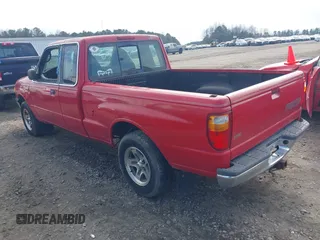 2003 Mazda B-Series 2WD Truck SE with VIN 4F4YR46V33TM13768, listed as a IAAI auction lot 41351910 with 212,641 mi miles. Bid and sale history available at carsss.com. Image 3.