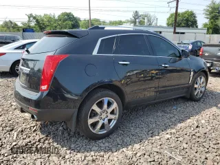 2011 Cadillac SRX Premium Collection z VIN 3GYFNFEY9BS606335, wystawiony jako Copart lot #59009285 z przebiegiem 152 828 mil mil oraz Szkoda całkowita • Salvage title. Historia ofert i sprzedaży dostępna na DreamBid. Obrazek 3.