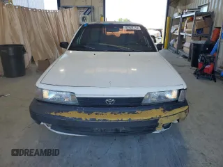 1991 Toyota Camry z VIN 4T1SV24E0MU402588, wystawiony jako Copart lot #82920114 z przebiegiem 124 644 mil mil oraz Szkoda całkowita • Salvage title. Historia ofert i sprzedaży dostępna na DreamBid. Obrazek 5.