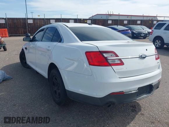 2013 Ford Police Interceptor with VIN 1FAHP2MT7DG130665, listed as a IAAI auction lot 42175336 with 147,739 mi miles and . Bid and sale history available at DreamBid. Image 3.
