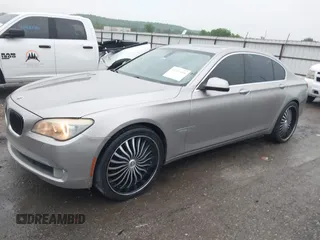 2012 BMW 7 Series 750i with VIN WBAKA8C50CDX01319, listed as a IAAI auction lot 42133359 with 168,986 mi miles and . Bid and sale history available at DreamBid. Image 2.