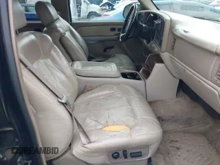 2001 Chevrolet Suburban LS z VIN 1GNEC16T21J217198, wystawiony jako IAAI lot #41779416 z przebiegiem 306 172 mil mil oraz . Historia ofert i sprzedaży dostępna na DreamBid. Obrazek 5.
