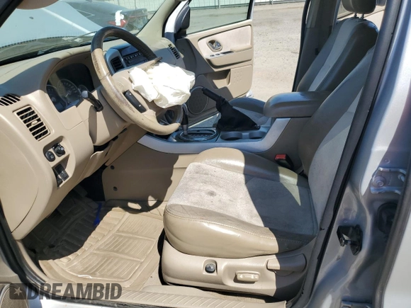 2005 Mercury Mariner Luxury z VIN 4M2YU56165DJ21260, wystawiony jako Copart lot #67528354 z przebiegiem Nie podano mil oraz Szkoda całkowita • Salvage title. Historia ofert i sprzedaży dostępna na DreamBid. Obrazek 7.