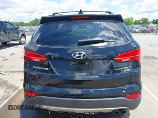 2013 Hyundai Santa Fe Sport z VIN 5XYZUDLA1DG050879, wystawiony jako IAAI lot #42236937 z przebiegiem 124 779 mil mil oraz . Historia ofert i sprzedaży dostępna na DreamBid. Obrazek 16.