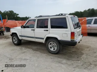 2001 Jeep Cherokee Sport with VIN 1J4FF48S31L520760, listed as a Copart auction lot 59807625 with 298,489 mi miles and Salvage title. Bid and sale history available at DreamBid. Image 2.