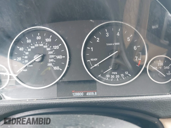 2015 BMW 3 Series 320i with VIN WBA3B1G57FNT05826, listed as a IAAI auction lot 42103193 with 128,800 mi miles. Bid and sale history available at carsss.com. Image 7.