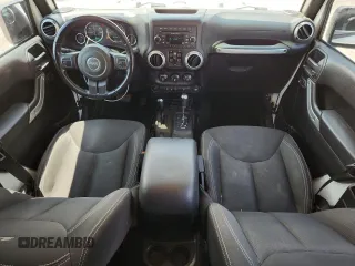 2016 Jeep Wrangler Unlimited Sahara с VIN 1C4HJWEG3GL346528, выставлен на аукционе Copart как лот 65092755 с пробегом 127 393 миль миль и Списание • Salvage title. История ставок и продаж доступна на DreamBid. Изображение 8.
