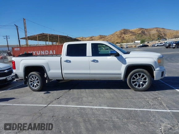 2014 GMC Sierra 1500 Denali z VIN 3GTU2WEJ2EG349289, wystawiony jako IAAI lot #41313698 z przebiegiem 190 441 mil mil oraz . Historia ofert i sprzedaży dostępna na DreamBid. Obrazek 13.