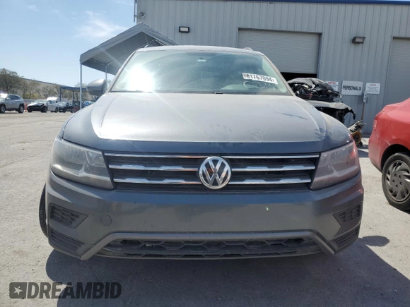 2020 Volkswagen Tiguan S with VIN 3VV0B7AX8LM025049, listed as a Copart auction lot 81767094 with 76,640 mi miles and Salvage title. Bid and sale history available at DreamBid. Image 5.