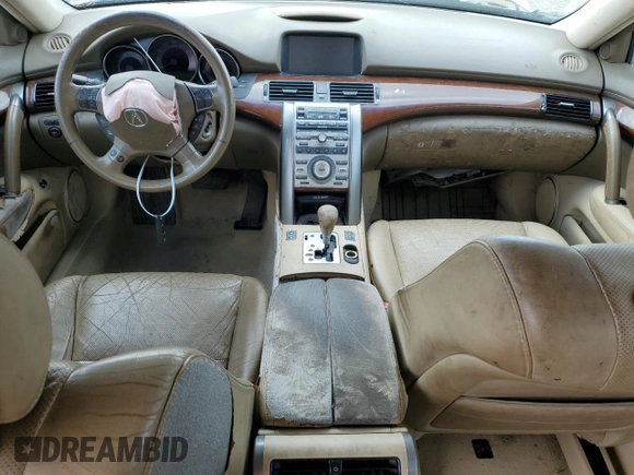 2006 Acura RL z VIN JH4KB16576C008162, wystawiony jako Copart lot #51801115 z przebiegiem Nie podano mil oraz Szkoda całkowita • Salvage title. Historia ofert i sprzedaży dostępna na DreamBid. Obrazek 8.