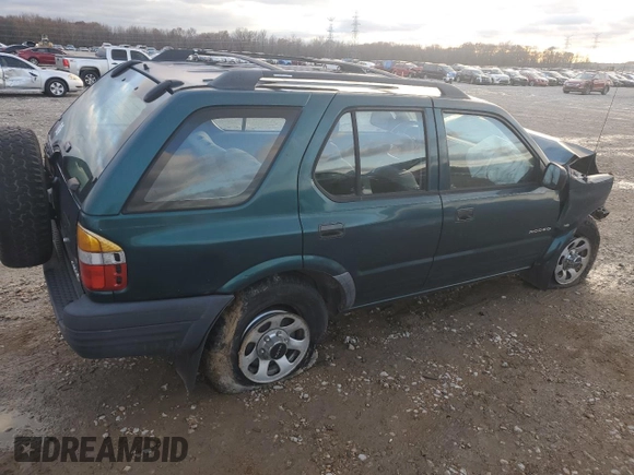 1999 Isuzu Rodeo S with VIN 4S2CK58W2X4312468, listed as a Copart auction lot 85753294 with Not Provided miles and Salvage Title. Bid and sale history available at DreamBid. Image 3.