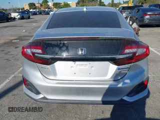 2019 Honda Clarity Touring z VIN JHMZC5F38KC003399, wystawiony jako IAAI lot #41818175 z przebiegiem 54 896 mil mil oraz . Historia ofert i sprzedaży dostępna na DreamBid. Obrazek 16.