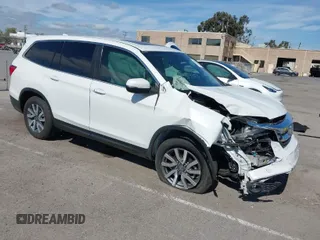 2020 Honda Pilot EX-L z VIN 5FNYF6H56LB056275, wystawiony jako IAAI lot #41890134 z przebiegiem 93 920 mil mil oraz . Historia ofert i sprzedaży dostępna na DreamBid. Obrazek 1.