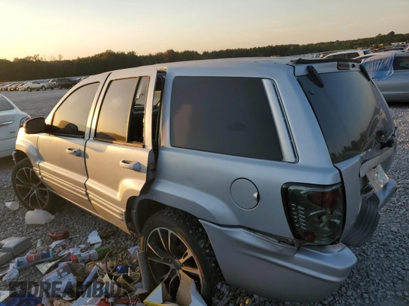 2004 Jeep Grand Cherokee with VIN 1J8GX58J54C284761, listed as a Copart auction lot 75614854 with 182,188 mi miles and Salvage title. Bid and sale history available at DreamBid. Image 2.