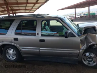2001 GMC Jimmy SL with VIN 1GKCS13WX12222794, listed as a IAAI auction lot 41949569 with 169,961 mi miles. Bid and sale history available at carsss.com. Image 13.
