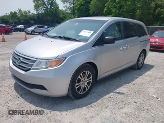 2012 Honda Odyssey EX z VIN 5FNRL5H44CB038825, wystawiony jako IAAI lot #42411401 z przebiegiem 214 164 mil mil oraz . Historia ofert i sprzedaży dostępna na DreamBid. Obrazek 2.
