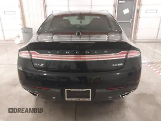 2015 Lincoln MKZ z VIN 3LN6L2J95FR620390, wystawiony jako IAAI lot #41586267 z przebiegiem 127 870 mil mil oraz . Historia ofert i sprzedaży dostępna na DreamBid. Obrazek 16.